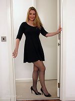 Hot babe Anna can't decide whether to tease you inside or outside wearing her silky nylons and sexy heels
